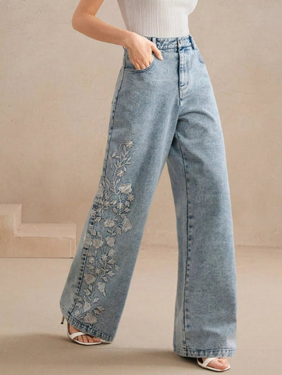 High-rise wide-leg jeans with climbing floral embroidery