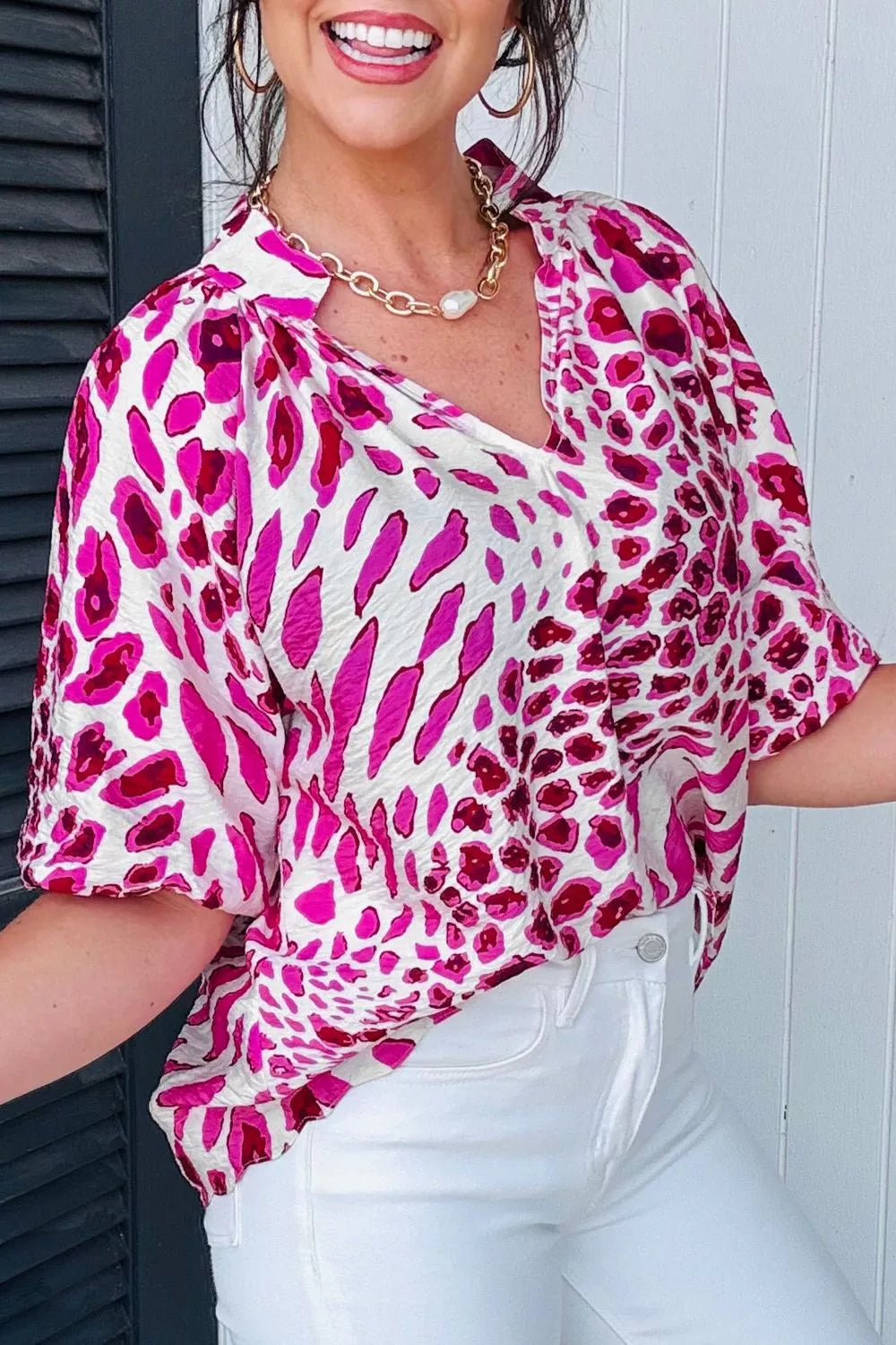 Leopard print V-neck blouse with puff sleeves