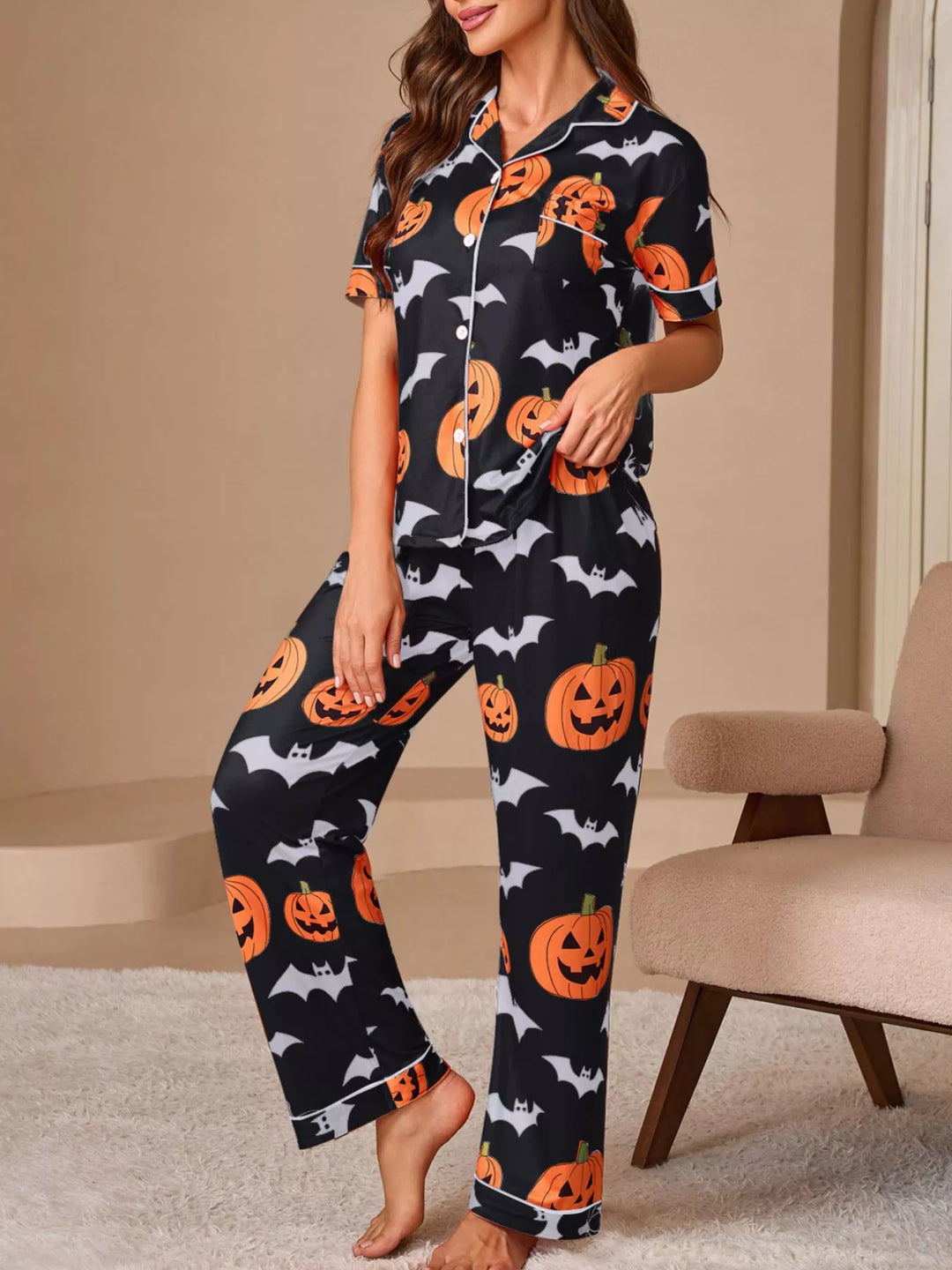 Black Pumpkin and bat print short sleeve pajama set with piped trim