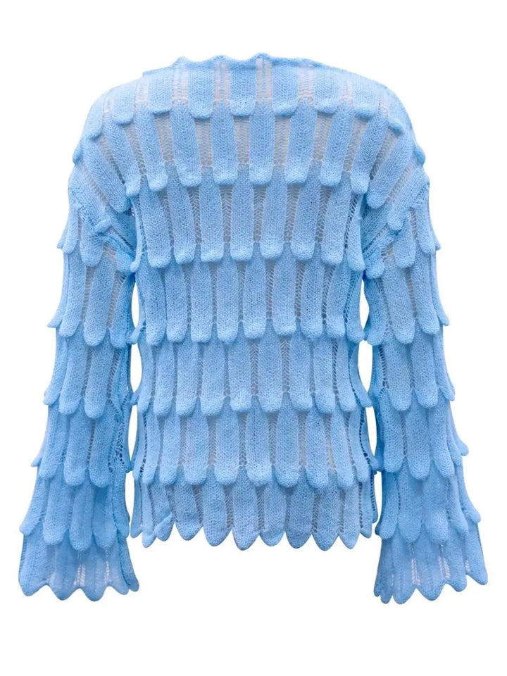 Openwork textured knit top with bell sleeves and scalloped hem