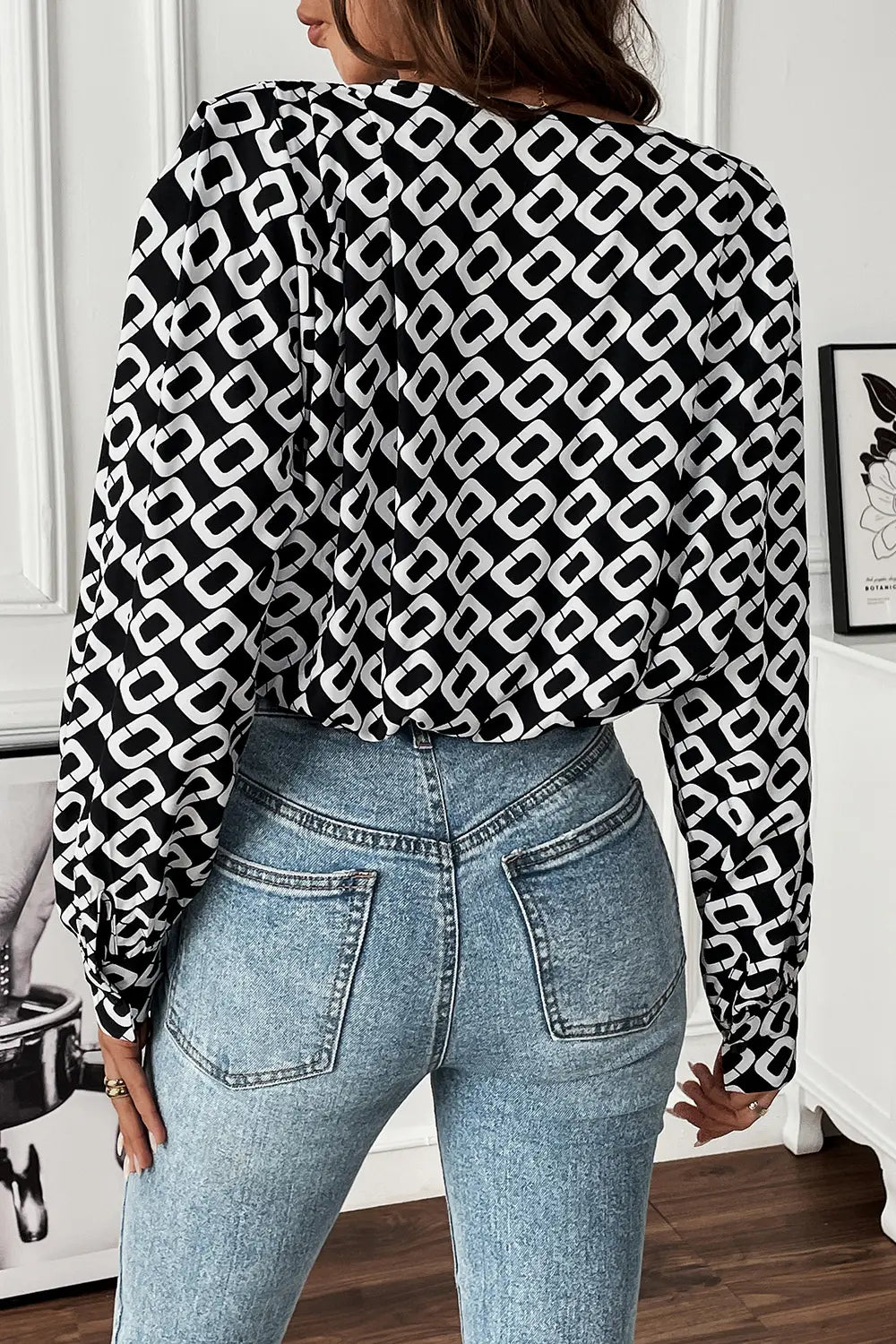 Geometric print wrap-front V-neck long sleeve blouse