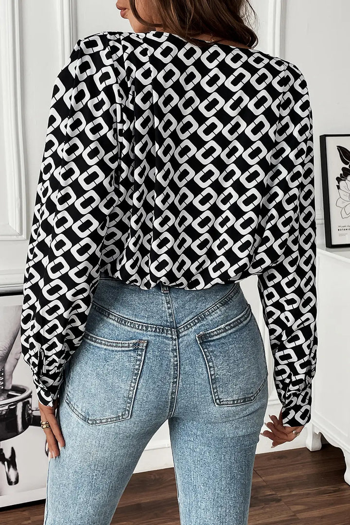 Geometric print wrap-front V-neck long sleeve blouse