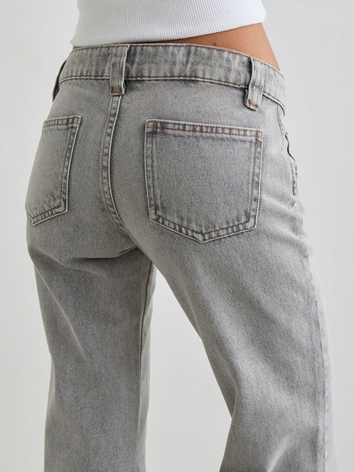 Low-rise washed denim flare leg jeans with 5-pocket styling
