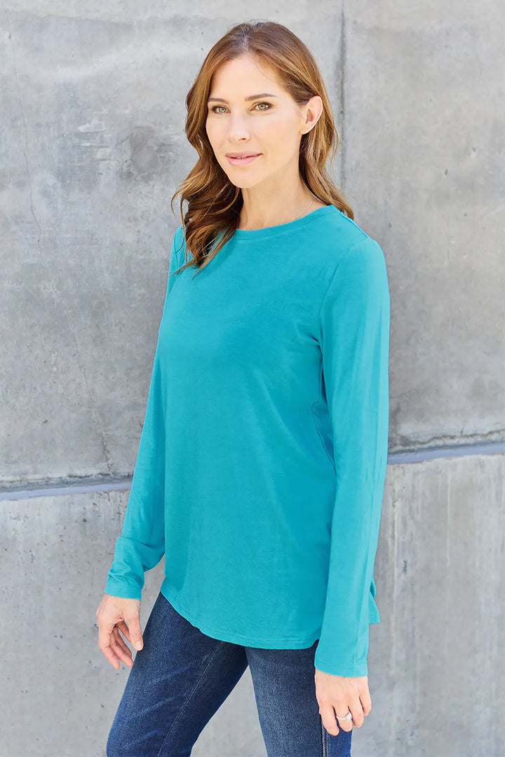 Crew neck long sleeve top with curved hem