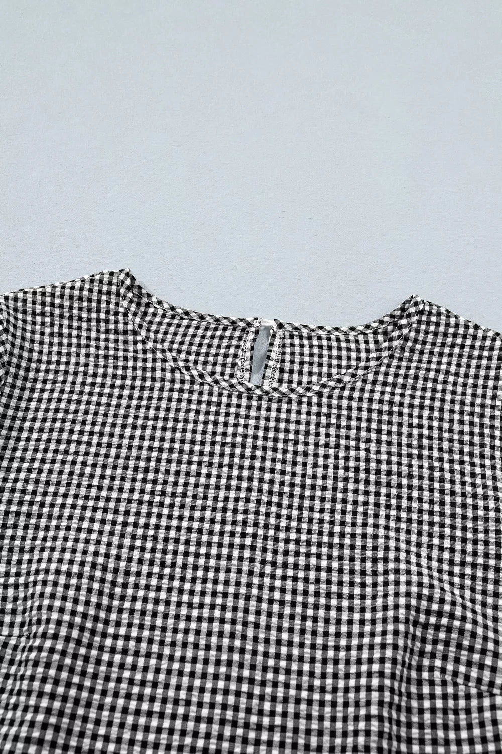 Gingham ruffle half-sleeve crew neck blouse