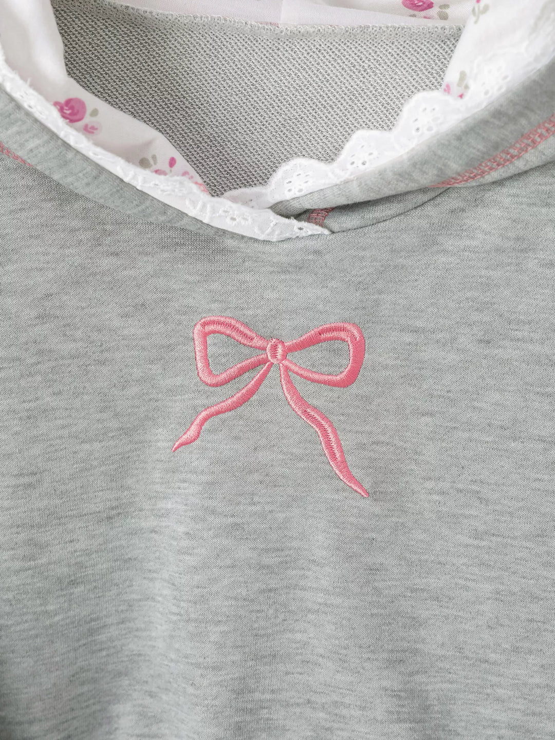 Bow embroidered hoodie with lace trim and front pocket