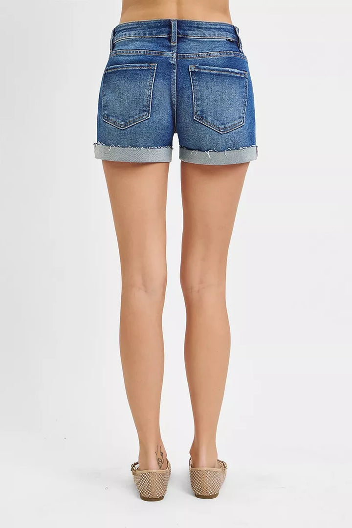 Cuffed low-rise denim shorts with raw hem detail