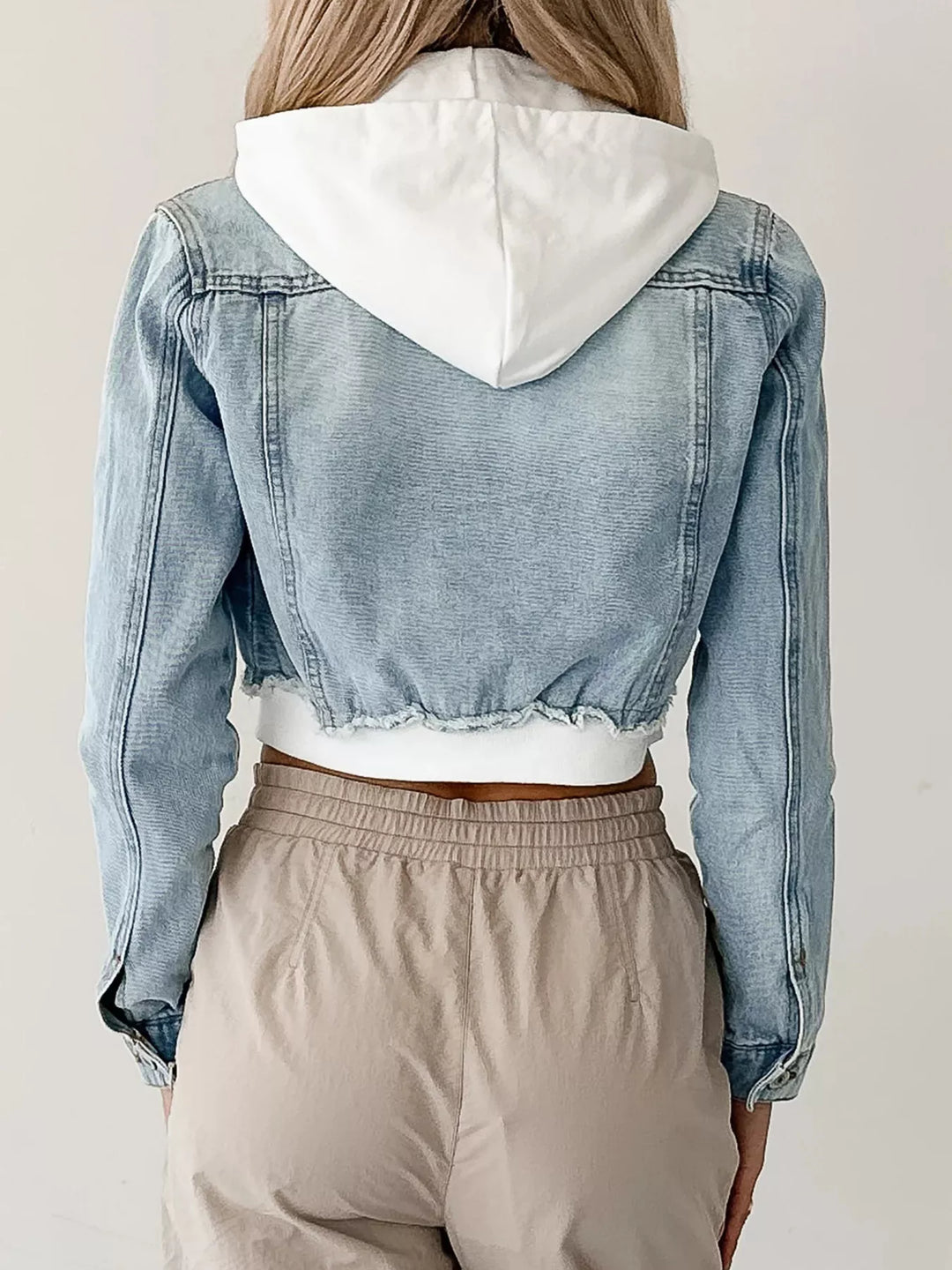 Distressed cropped hooded denim jacket with zip front