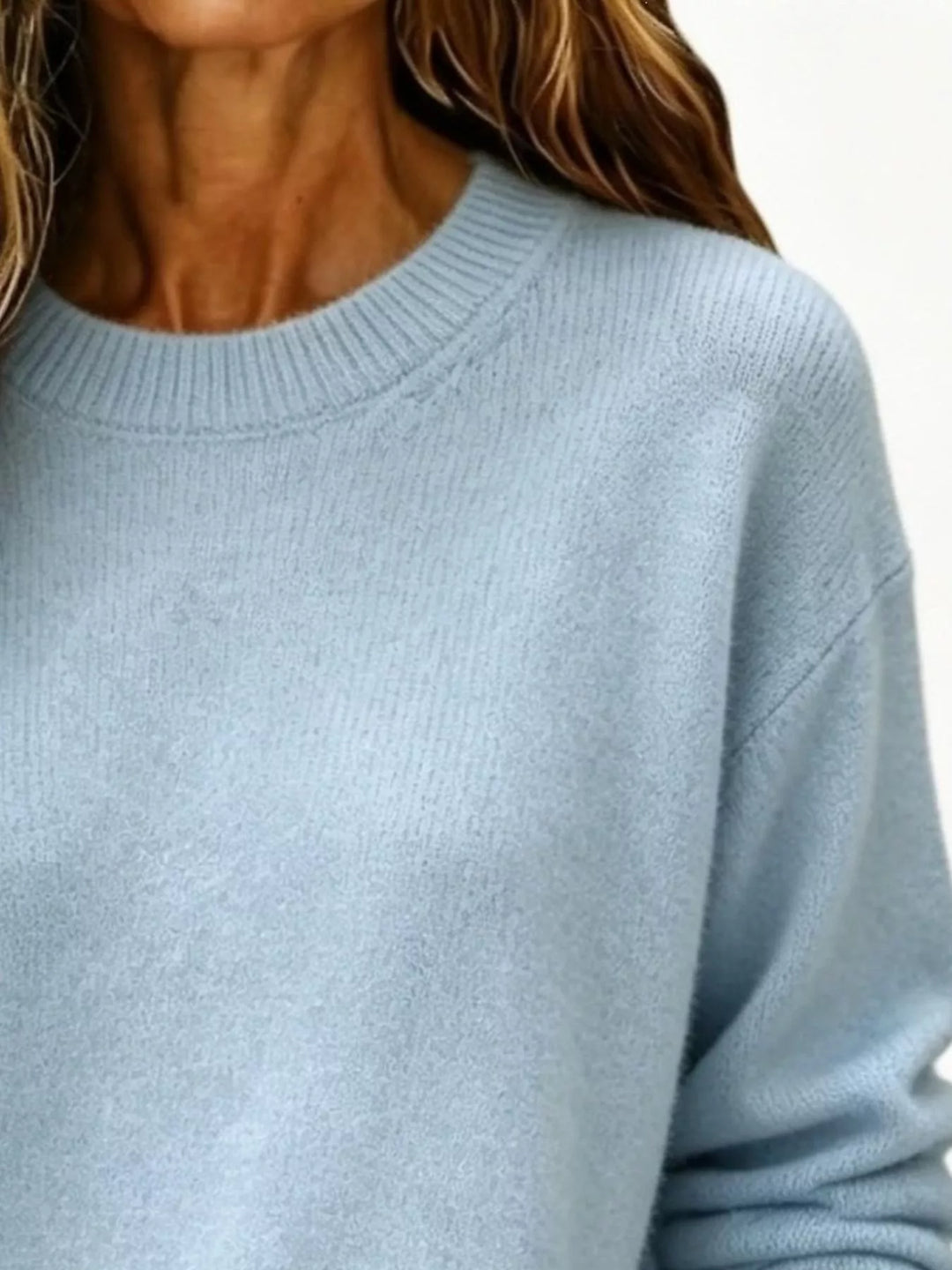 Soft brushed knit sweater with ribbed cuffs and drop shoulders