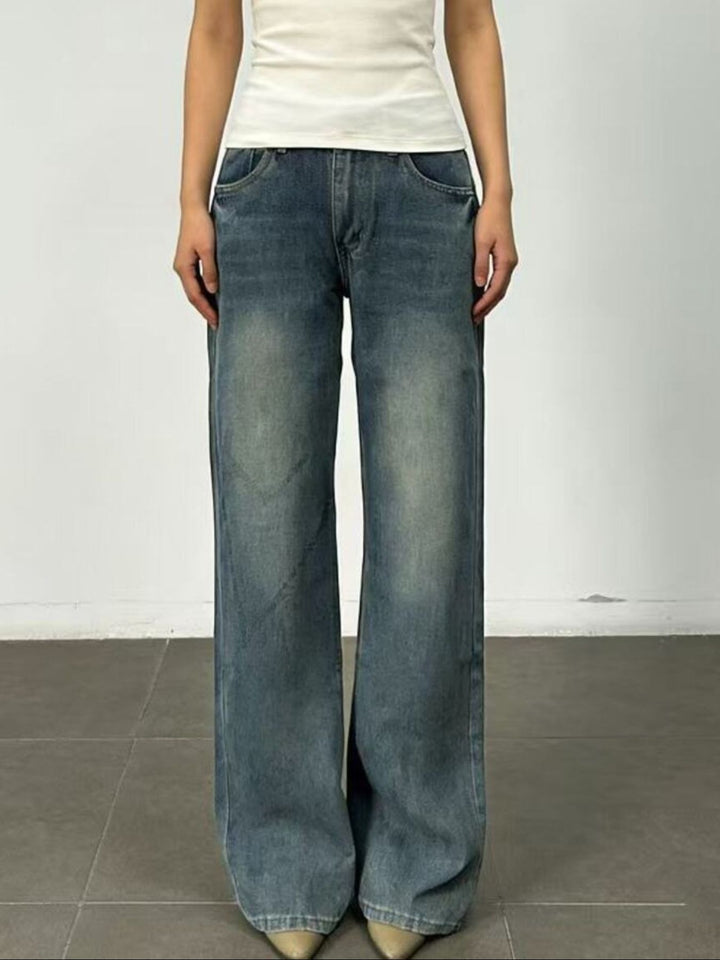 Vintage wash wide leg jeans with whiskered fading