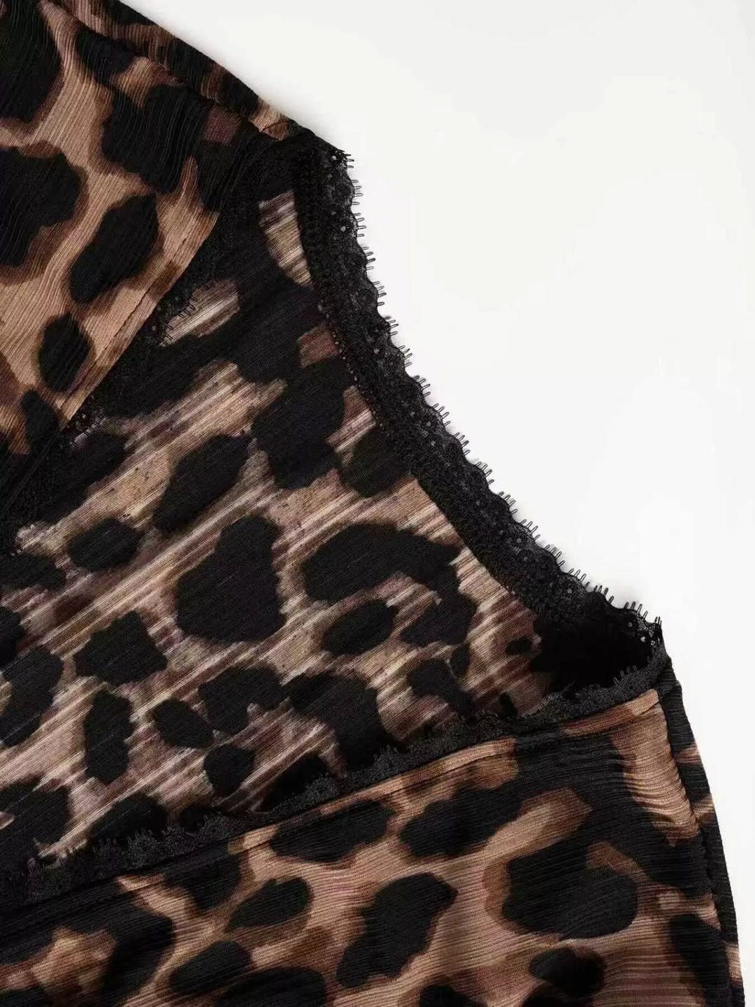 Ribbed leopard print button-up top with long sleeves
