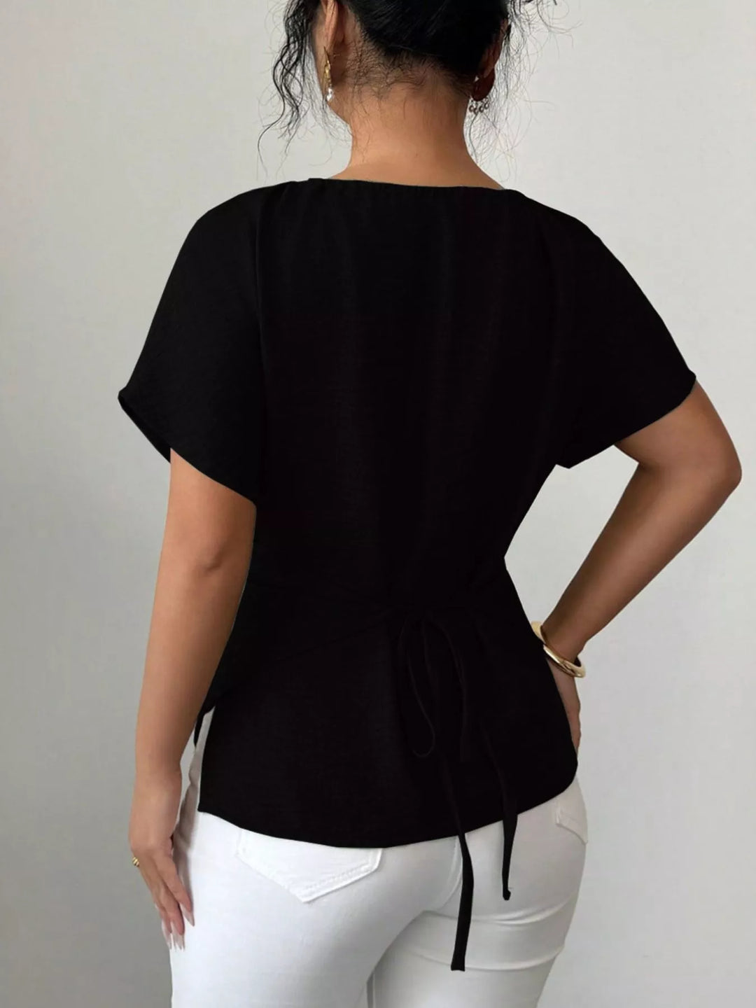 Wrap-front short sleeve blouse with beaded keyhole neckline