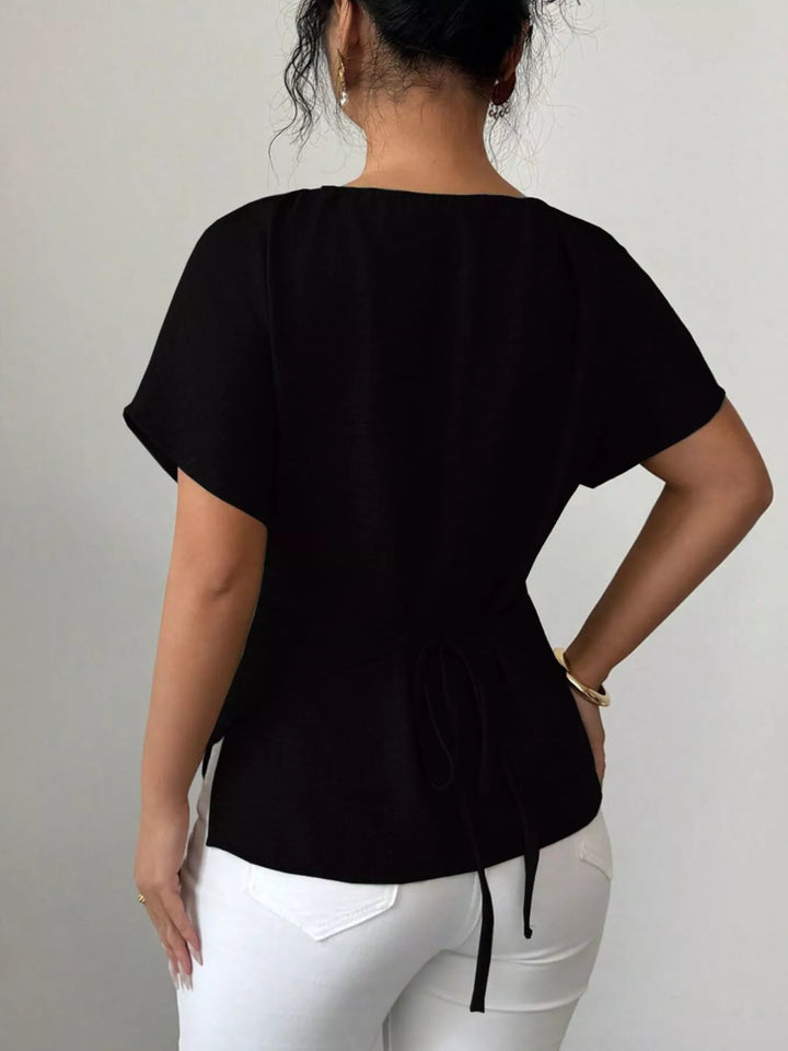 Wrap-front short sleeve blouse with beaded keyhole neckline