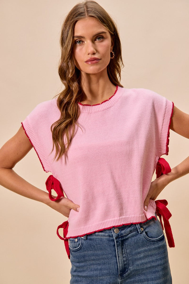 Dolman sleeve knit sweater top with side ribbon ties