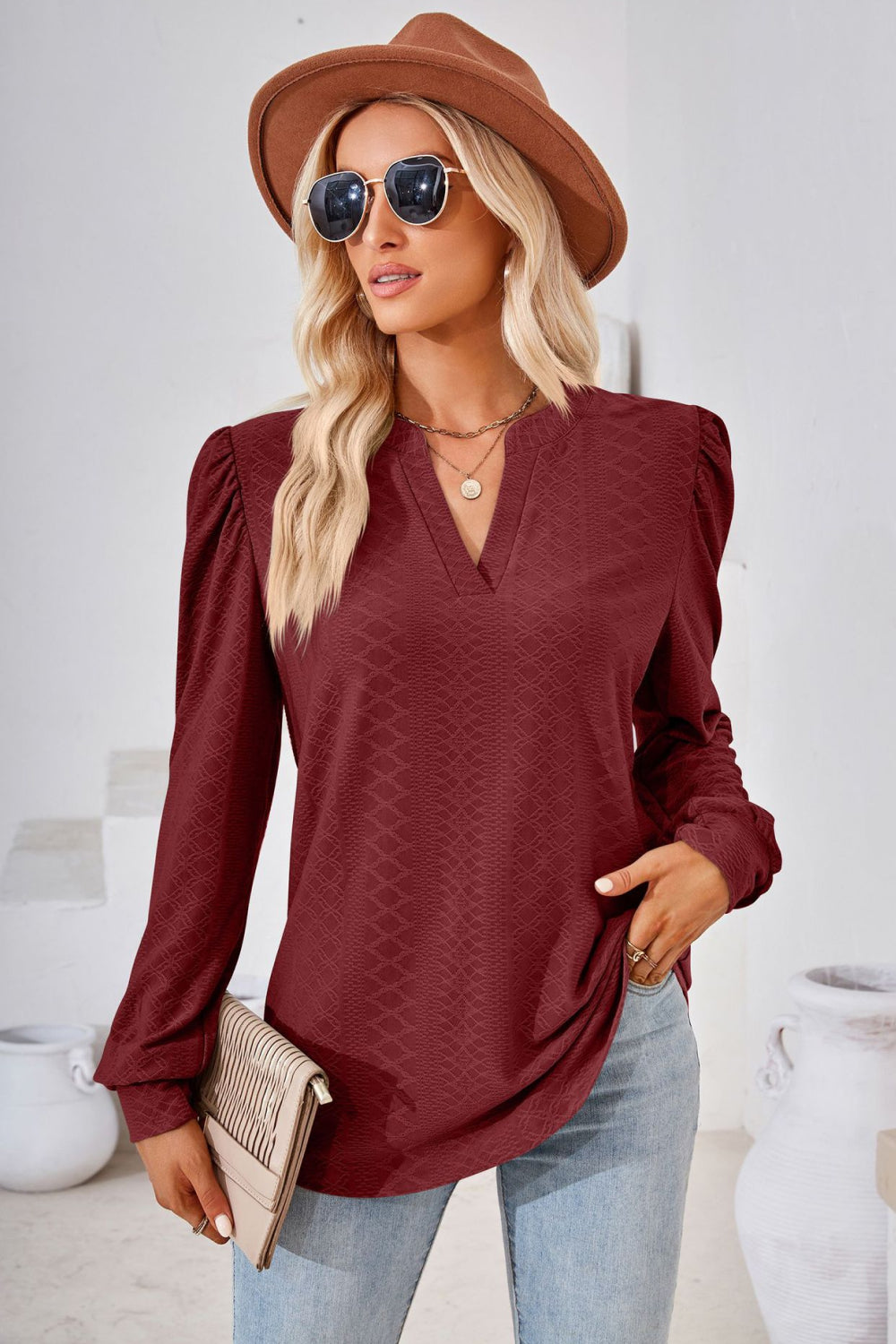 Textured knit split-neck puff sleeve blouse