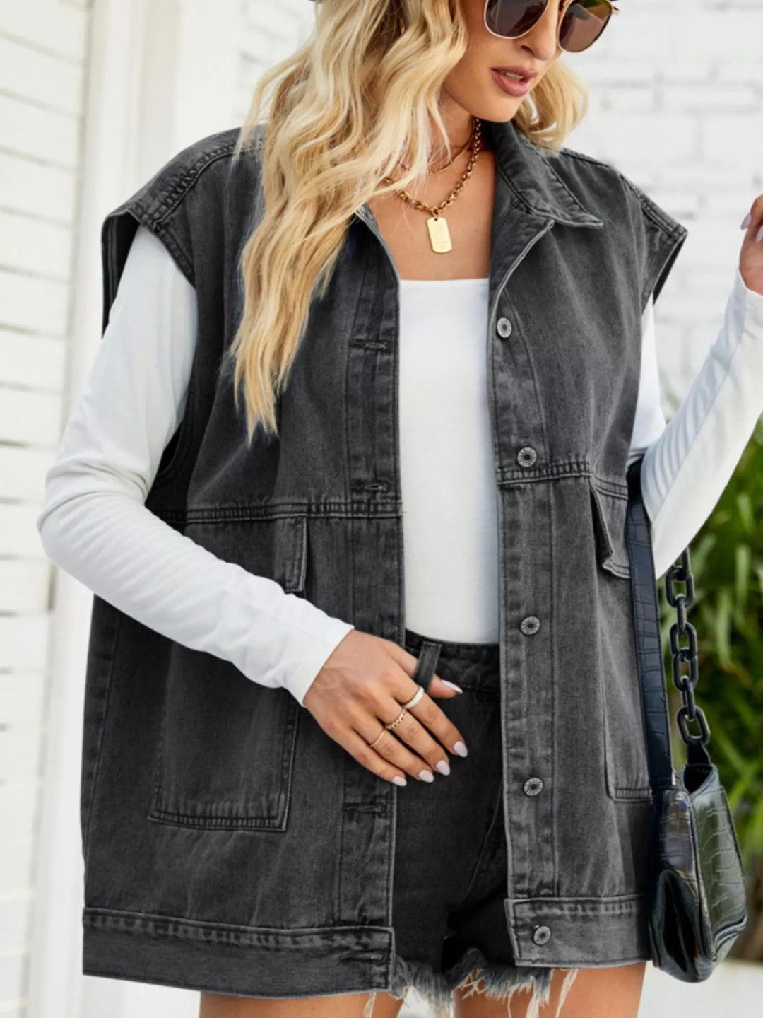 Sleeveless button-down denim vest jacket with patch pockets