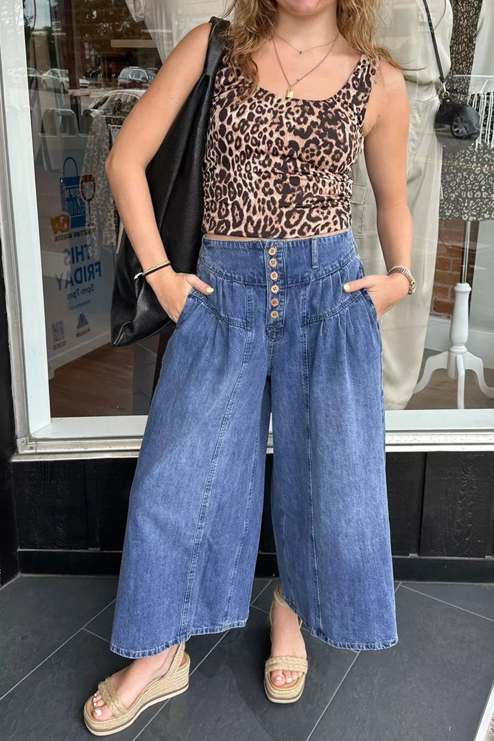 High-rise wide-leg button-fly jeans with pleated waist