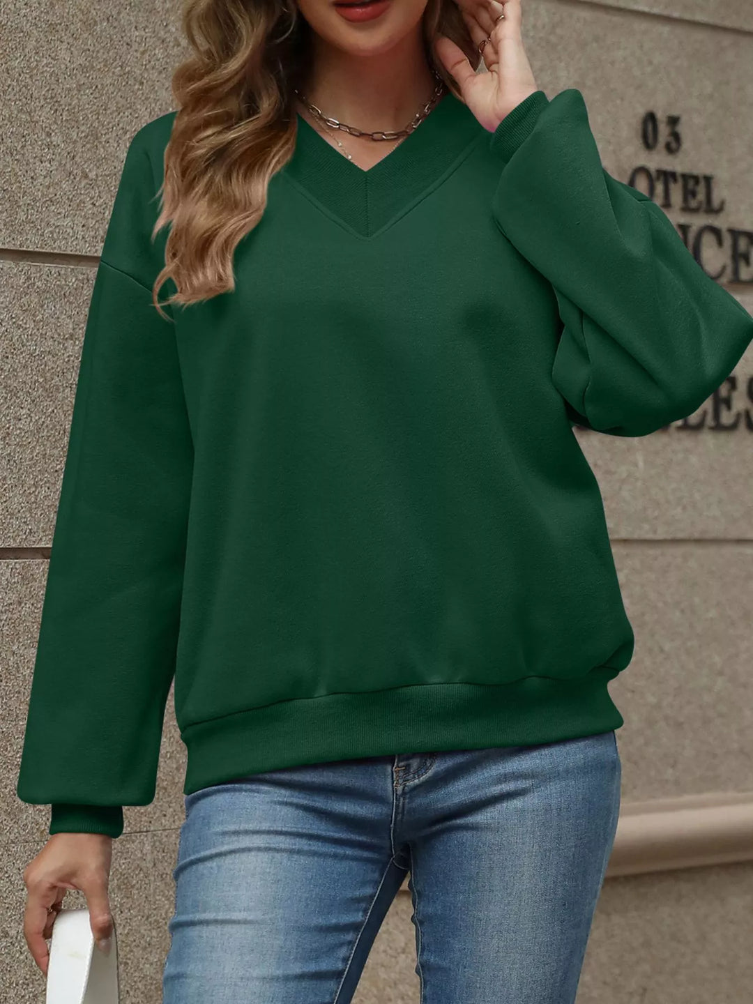 V-neck drop-shoulder pullover sweatshirt with ribbed trim