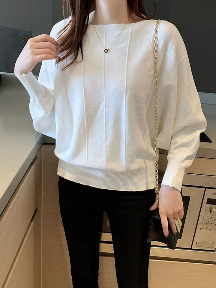 Boat neck batwing sleeve knit pullover with ribbed hem