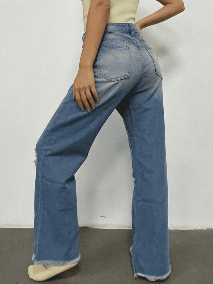 Distressed high-rise cropped bootcut jeans with raw hem