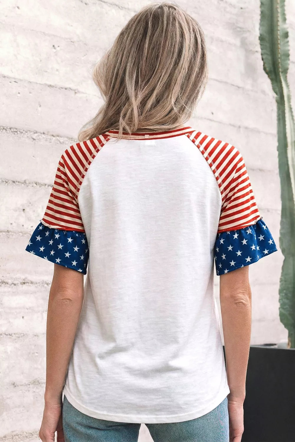 Star patch flag-inspired V-neck top with ruffle sleeves