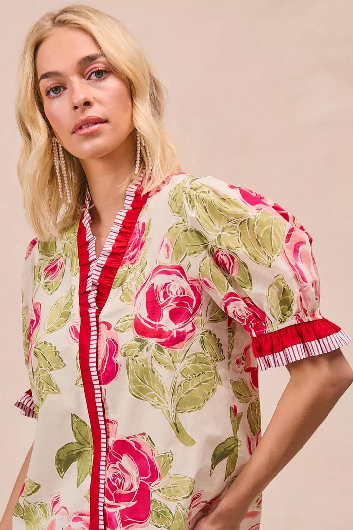 Floral rose cotton blouse with contrast trim and ruffle cuffs