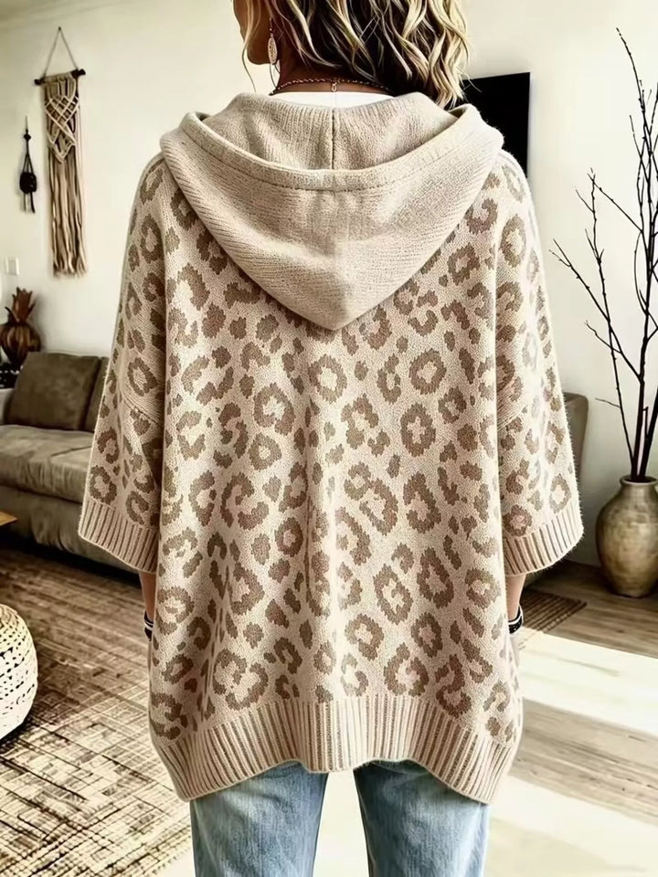 Leopard print drawstring hooded sweater with dolman sleeves