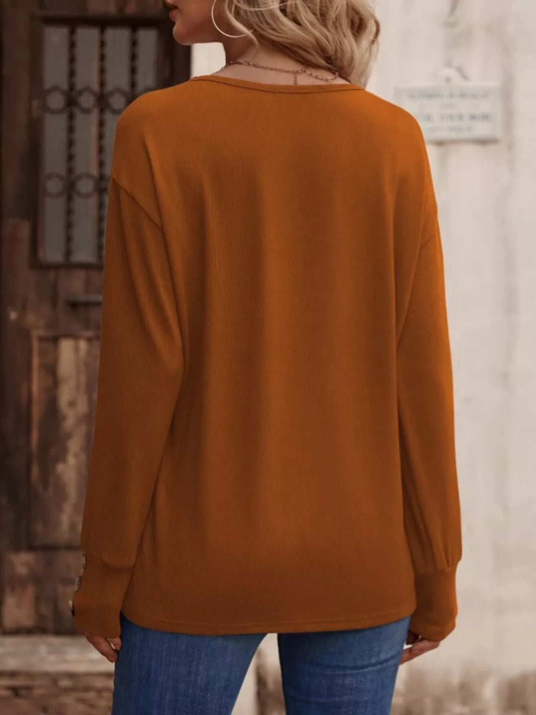 V-neck long sleeve top with button cuffs