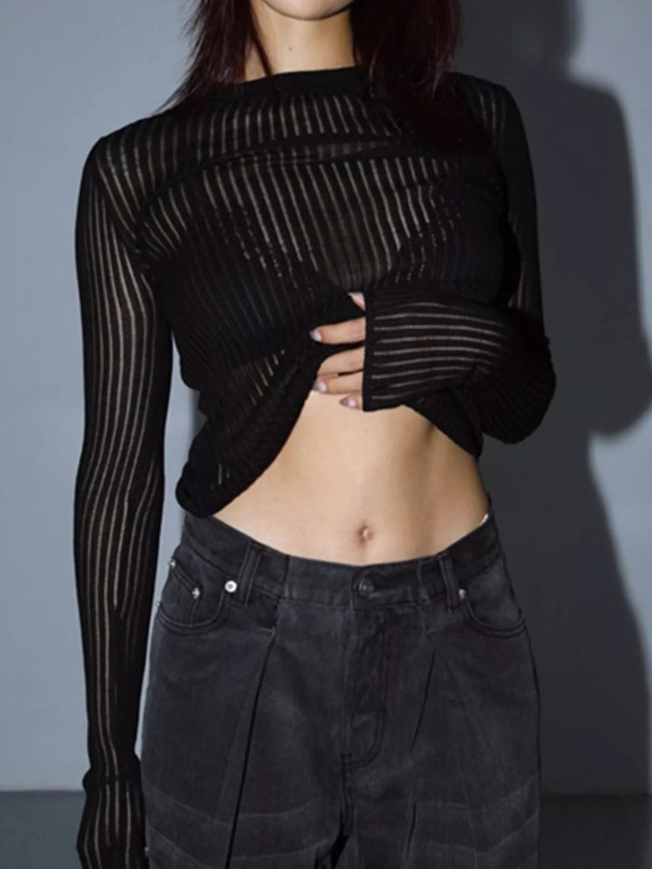 Sheer ribbed knit long sleeve top with flared cuffs