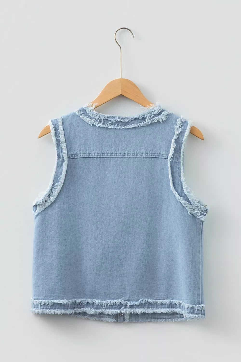 Frayed edge denim vest with snap flap pockets