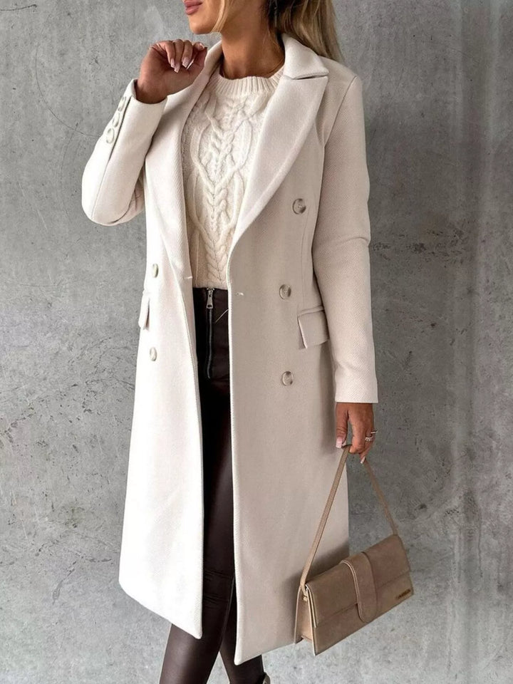 Double-breasted longline coat with notch lapel and flap pockets