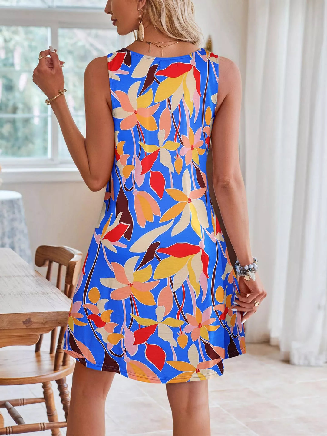 Tropical leaf print V-neck mini dress with crochet trim