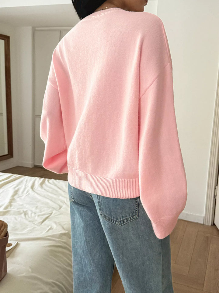 V-neck loose knit sweater with ribbed trim