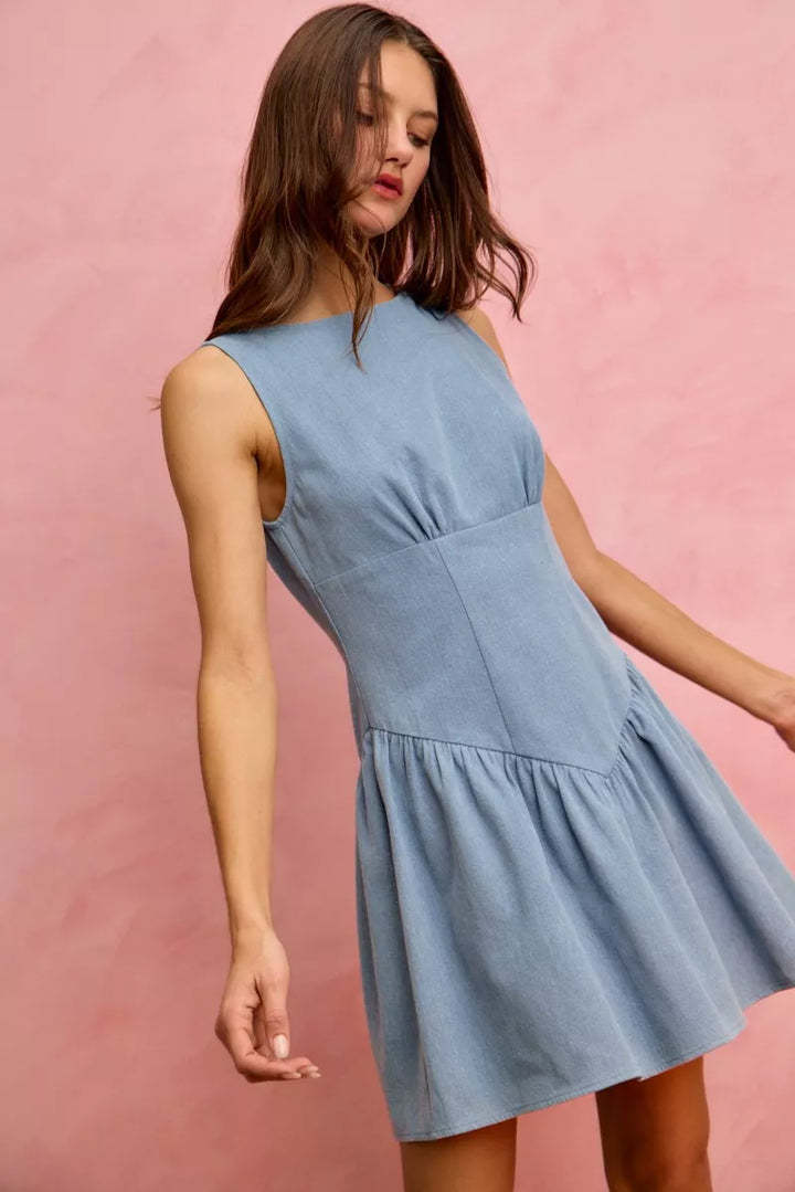 Sleeveless boat neck denim mini dress with flounce hem