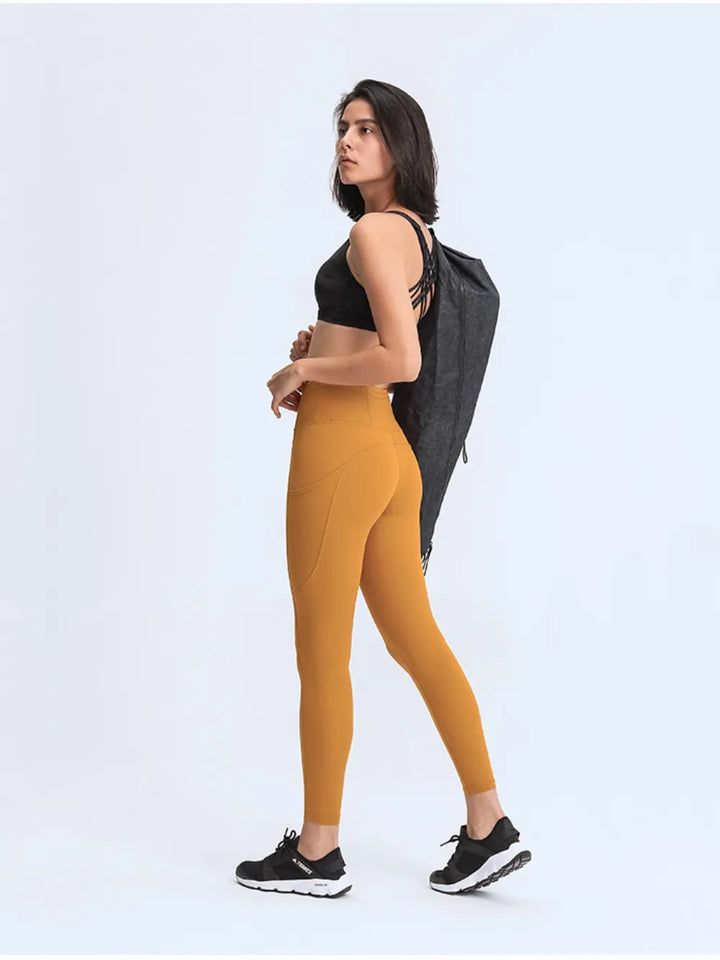 Wide waistband high-rise leggings with side pockets