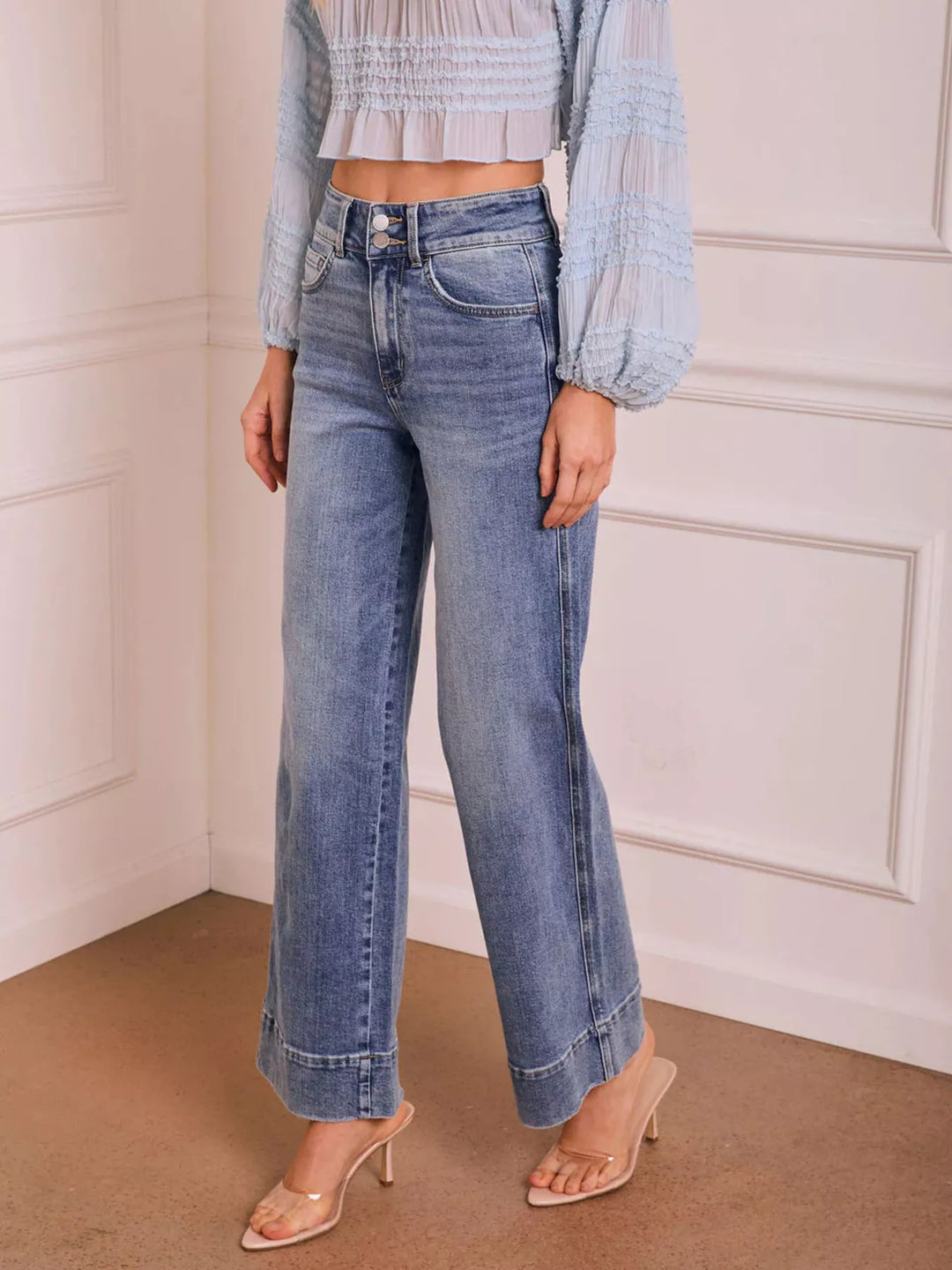 Washed high-rise wide-leg jeans with released hem