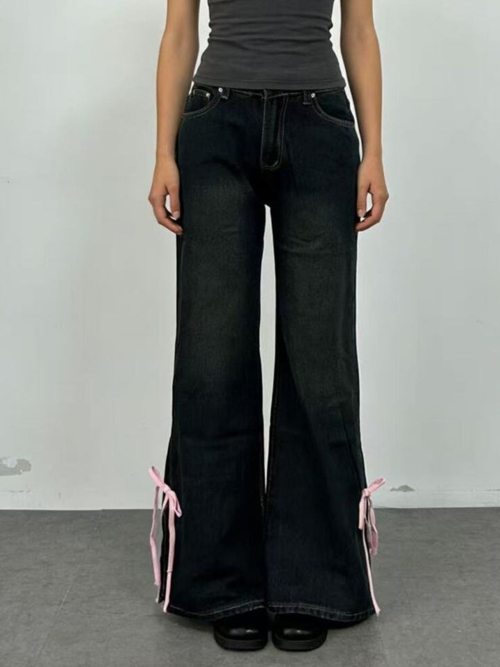 Low-rise flare jeans with ribbon bow leg slits