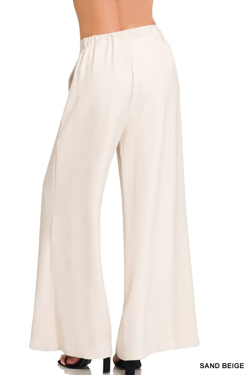 Relaxed wide-leg palazzo pants with elastic waist and pockets