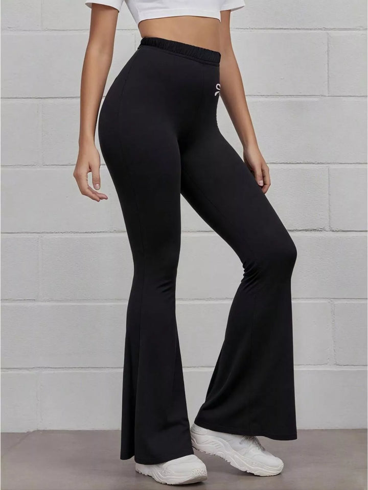 High-rise flare active pants with embroidered bow