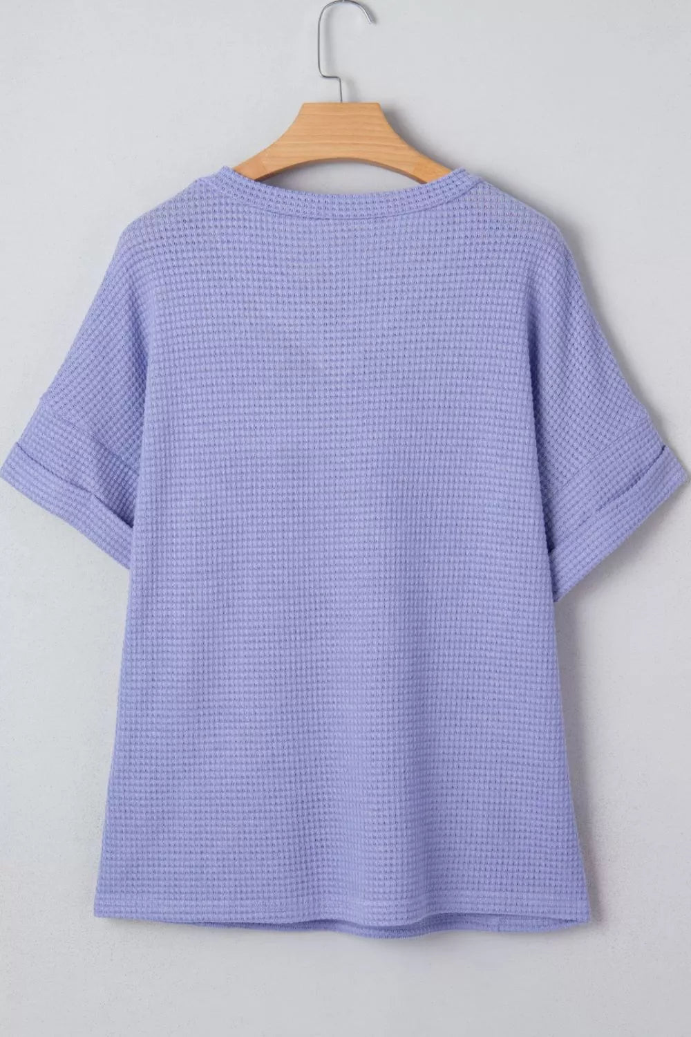 Plus size waffle knit V-neck top with cuffed short sleeves