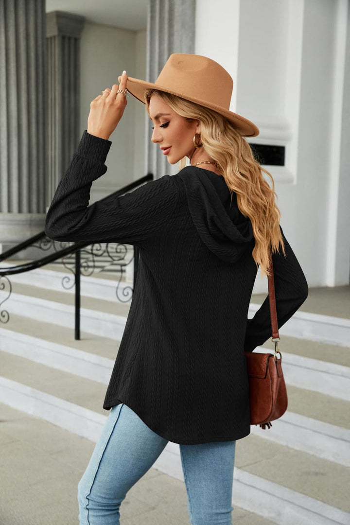Cable knit hooded top with tie neck and button placket