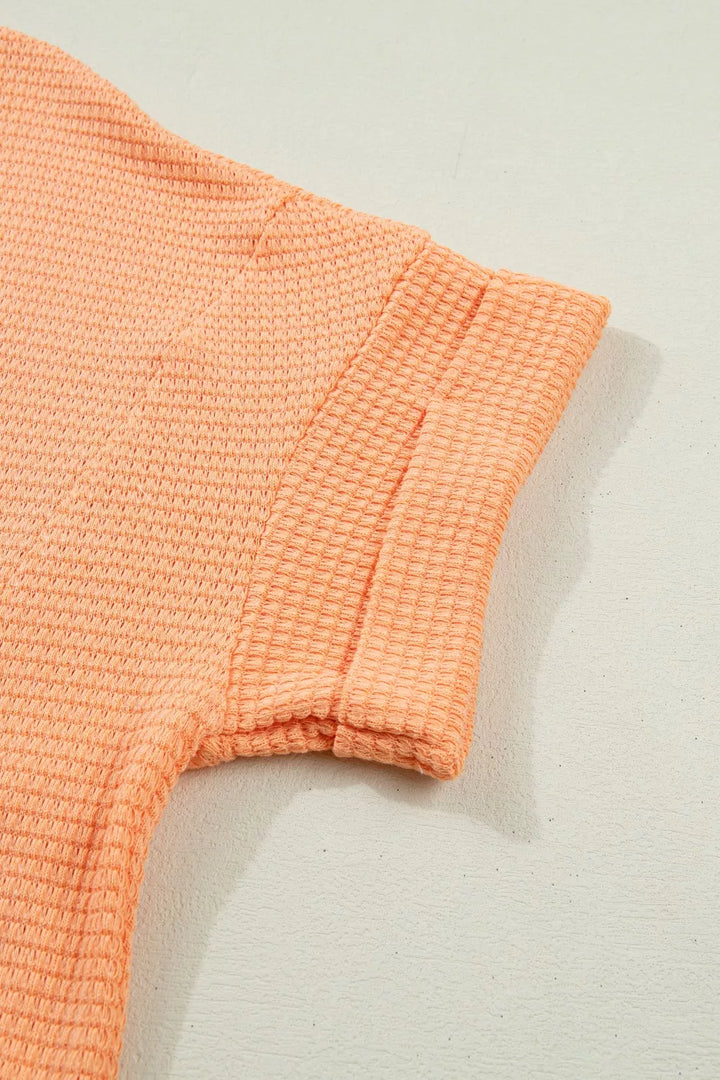 Waffle knit V-neck tee with cuffed short sleeves