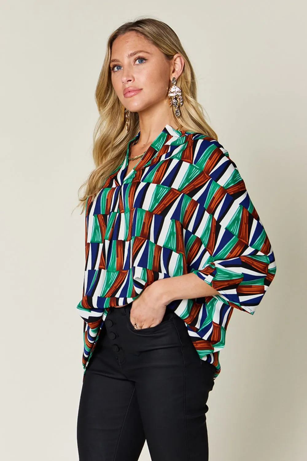 Geometric print notched neck dolman sleeve top