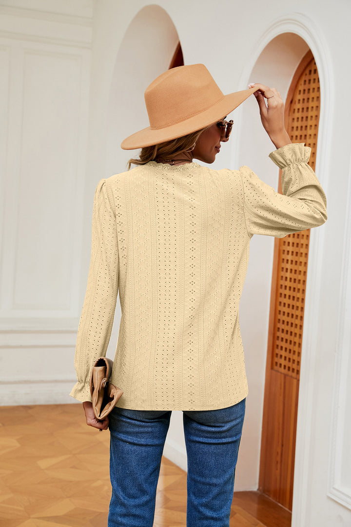 Eyelet V-neck blouse with flounce sleeves and lace trim