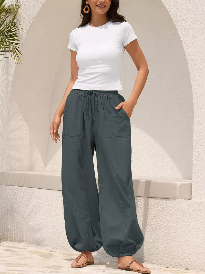 Drawstring waist wide-leg harem joggers with side pockets