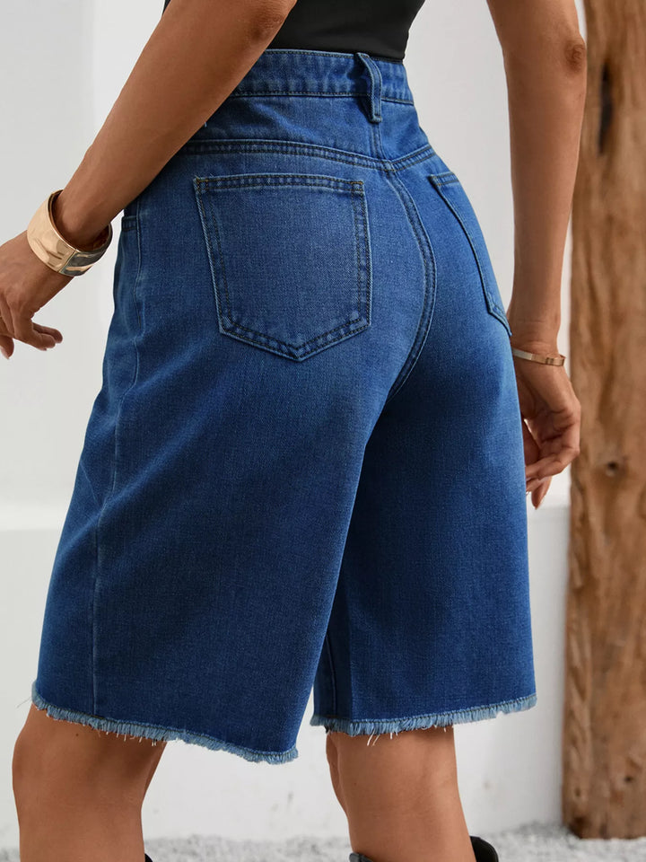 Distressed high-rise denim bermuda shorts with frayed hem