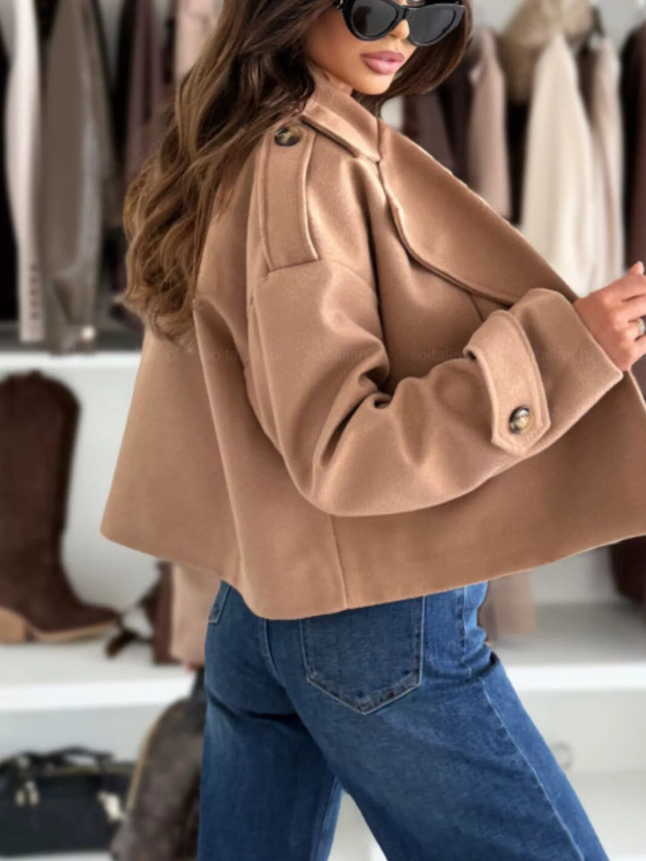 Double-breasted cropped coat with notch lapels and button cuffs
