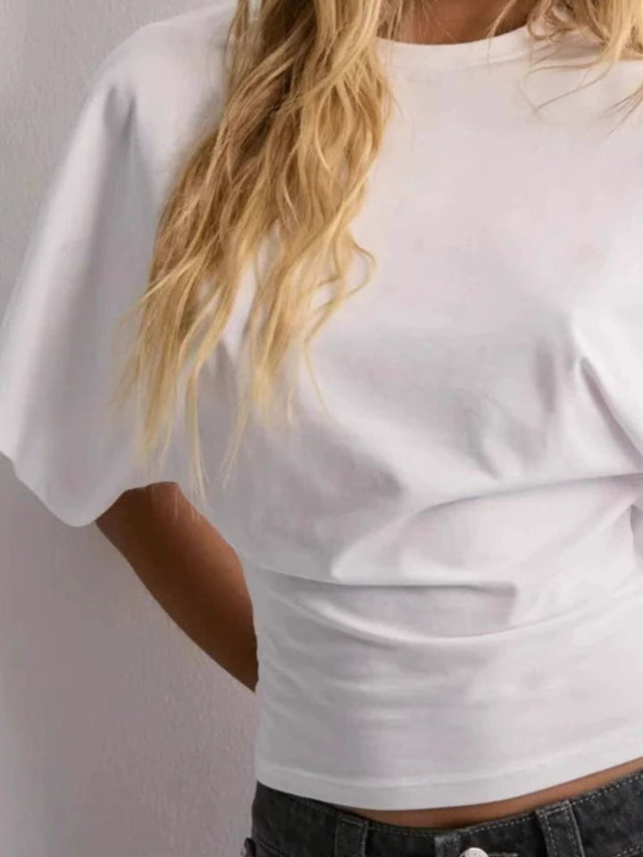 Batwing sleeve crop top with fitted waist and crew neck