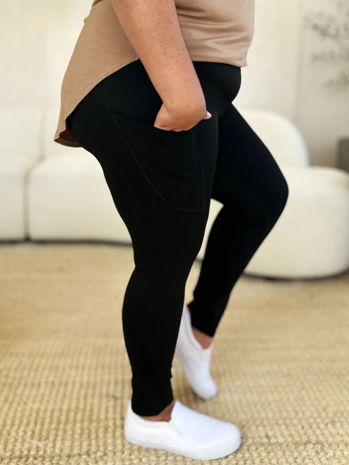 Wide waistband sports leggings with side pockets