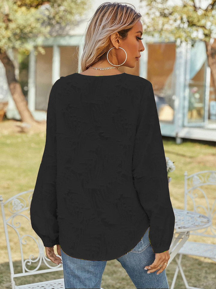 Textured v-neck blouse with balloon sleeves